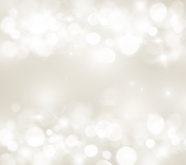 Fototapeta na wymiar Blurred light beige background, bokeh, white circles, festive, glitter, light