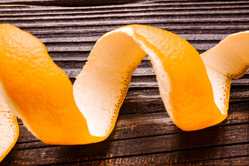oranges and juice on a wooden background