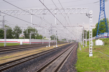 Fototapeta na wymiar railroad in spring rainy day, viev from station. background, transportation
