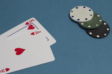 Cards and chips on a blue background, casino