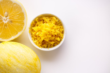 Lemon and juice on a white background