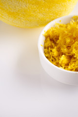 Lemon and juice on a white background