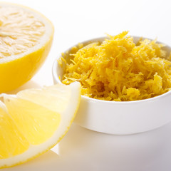 Lemon and juice on a white background