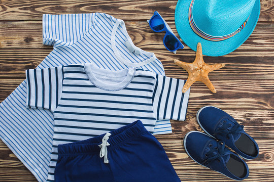 Flat lay picture of child`s summer clothes