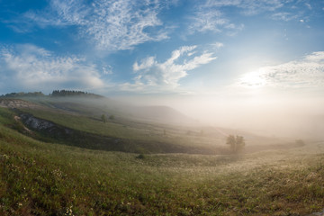 Fog in valley and over hills