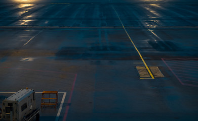 Nighttime aircraft parking. subject is blurred noise and low key.