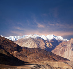 Karakoram mountain range at sunset in Ladakh, Jammu and Kashmir, North India