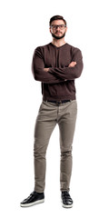 A young man in casual clothing stands with hands crossed in front view on a white background.