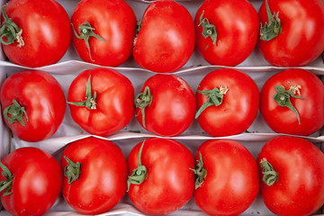 red tomatoes in a box