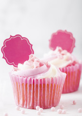 Cupcake muffin with raspberry cream dessert