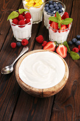 Yogurt and berry. Fresh fruit yogurt with fresh berries and peaches