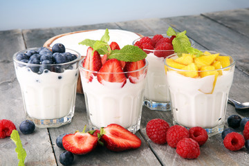Yogurt and berry. Fresh fruit yogurt with fresh berries and peaches