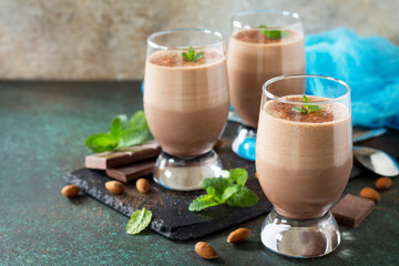 Homemade Dark Chocolate Mousse on a stone or slate background. Copy space.