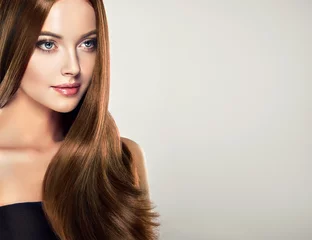 Fototapete Friseur Beautiful brunette girl with long straight smooth hair . A woman with healthy straight hairstyle   