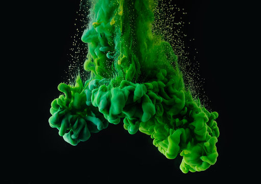 Bright Green Abstract Ink Explosion On Black Background