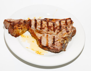 T-bone steak on plate