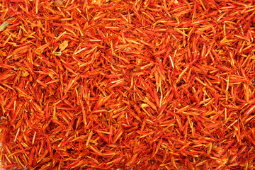 Heap of saffron as a background. Top view. Flat lay