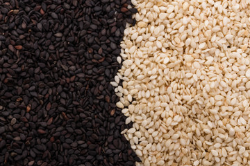 fresh sesame seeds on a rustic background