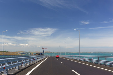 Cars go on the Crimean bridge across the Kerch Strait