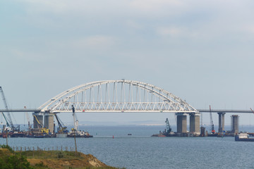 Arch span Crimean bridge across the Kerch Strait. Spring day