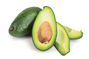 whole and half avocado isolated on white background close-up. Top view