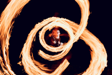 Fire show. Fire performance at the night.