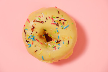 Delicious donut on pink background