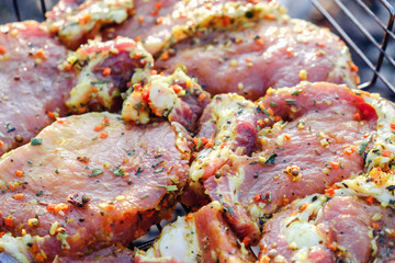 Beef meat steaks. Fresh raw pork neck for steak with herb spices on a barbecue grill