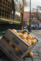 A box of oranges on the street of Buenos Aires