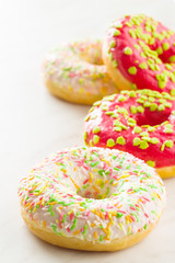 Sweet sprinkled donuts.