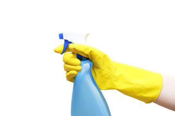 Hands in yellow rubber gloves hold a detergent with a pulvalizer for cleaning. Isolate, close-up