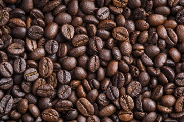 From above coffee beans textured background