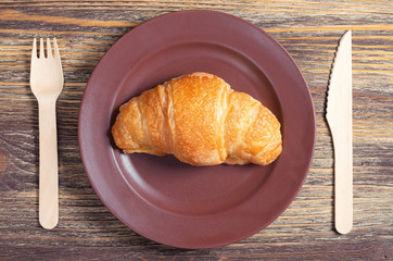 Croissant on table
