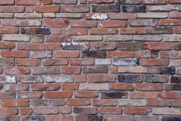 red brick wall texture grunge background, closeup