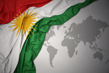 waving colorful national flag of kurdistan. © luzitanija
