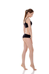 woman with perfect sporty body in black lingerie