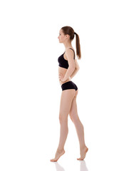 Fototapeta premium woman with perfect sporty body in black lingerie