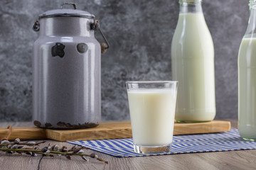 Detail on a glass jar with fresh unpasteurized milk