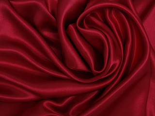 Smooth elegant red silk or satin luxury cloth texture as abstract background. Luxurious valentines day background design