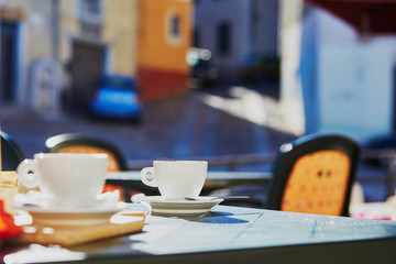 Coffee cups on table of cafe or restaurant