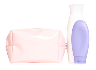 A female cosmetic bag with cosmetics cream lotion on a white background isolation