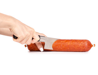 A smoked sausage knife in hand on a white background isolation
