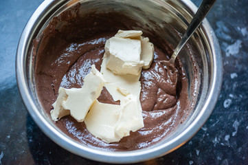 Mixing Batter and dough for muffin or cupcakes. Process of preparation of cupcakes. Close up, soft focus. Homemade cupcake.