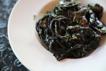 Spaghetti seafood with squid ink , Italian food