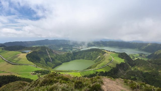 Aerial view of Lagoa de Santiago located in Sete Cidades volcano complex, Sao Miguel island, Azores, Portugal (time lapse video)
