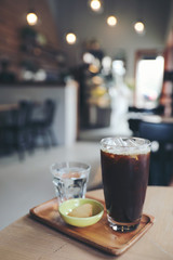 Iced black coffee on coffee shop