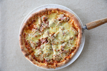 Pizza ham bacon with cheese and tomato sauce