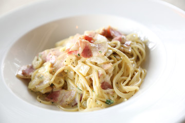 Spaghetti carbonara white sauce with bacon and cheese