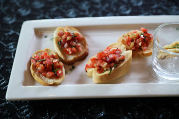 Bread with tomato , bruschetta italian appetizer