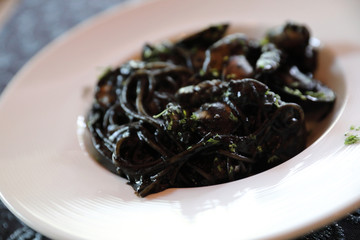Spaghetti seafood with squid ink , Italian food